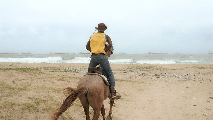 LR_Cowboy rides towards sea_Cowboy still_K.Ashadu